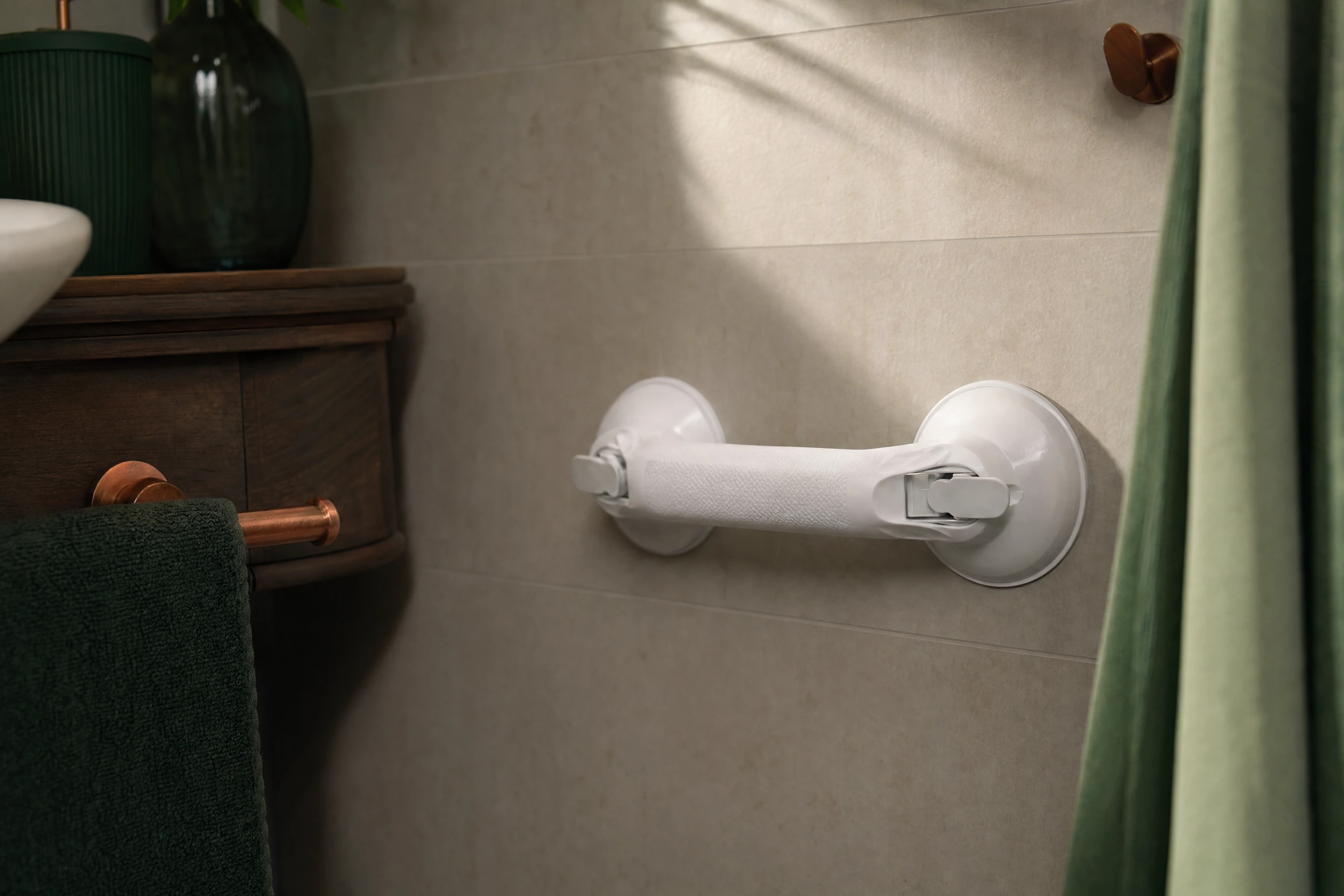 Illustrative suction-handle scene on a smooth bathroom surface